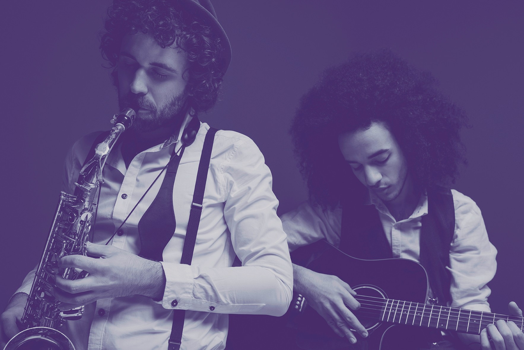 duet of musicians playing sax and guitar on black