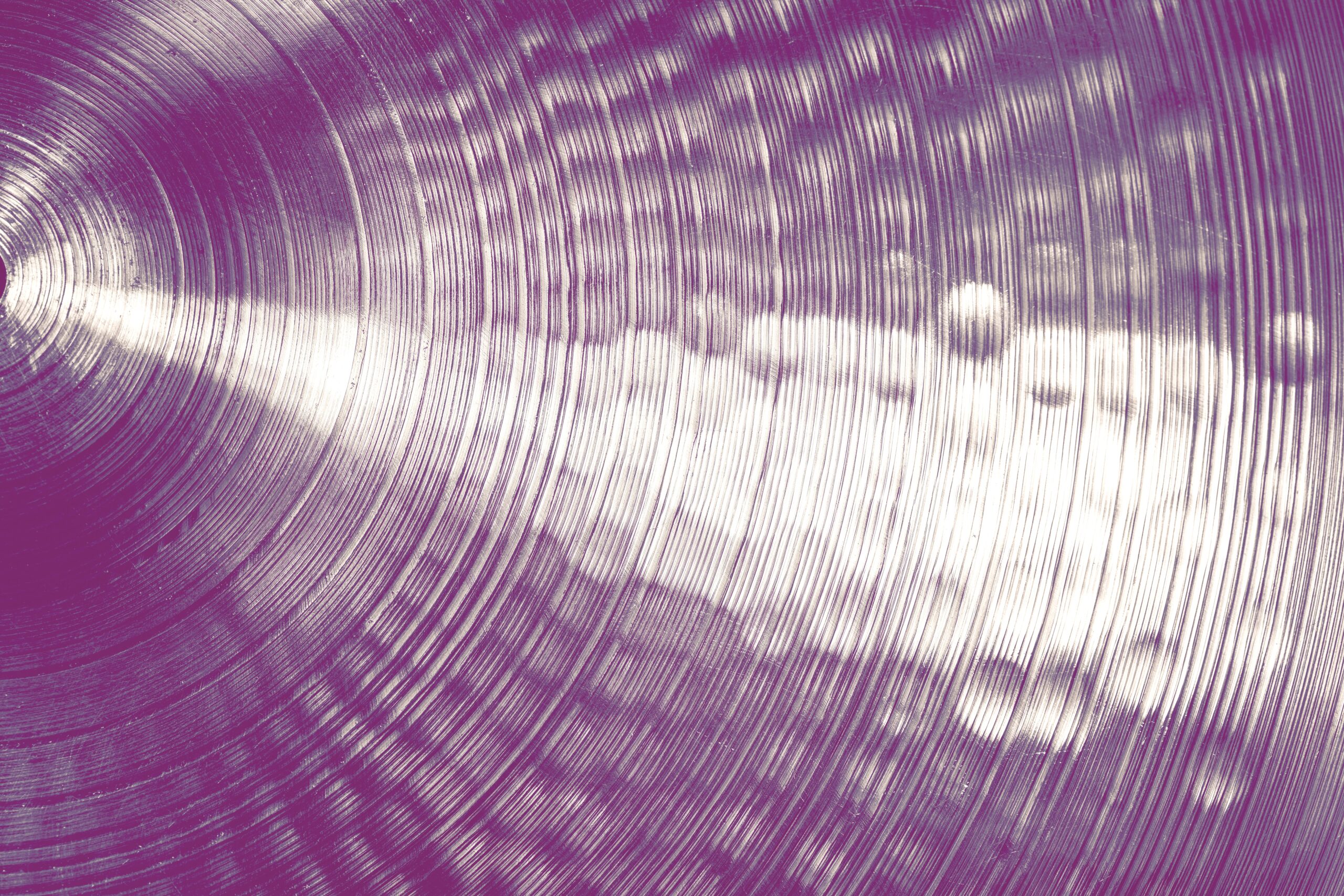 Extreme close-up of an old golden cymbal of drum kit. Percussion instrument