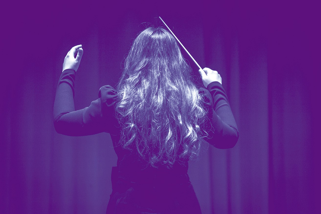 Istanbul, Turkey - 08.08.2023: Istanbul Philharmonic Society was founded in 1945. Stage, classical music, maestro, woman, director, conductor, performer, concert, stage.